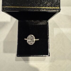 Sparkling Halo Oval Solitaire Ring - White